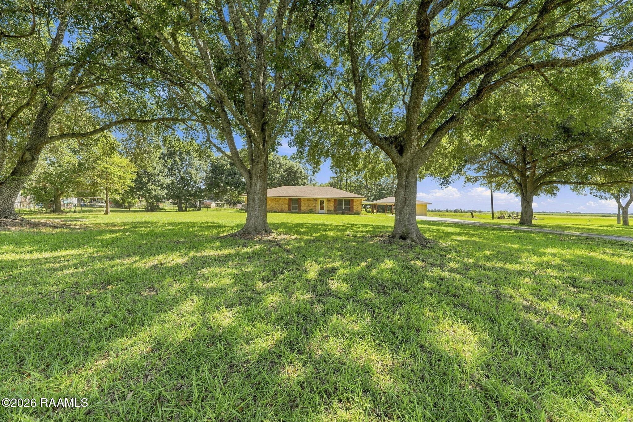9425 Coulee Kinney-Front yard showing th